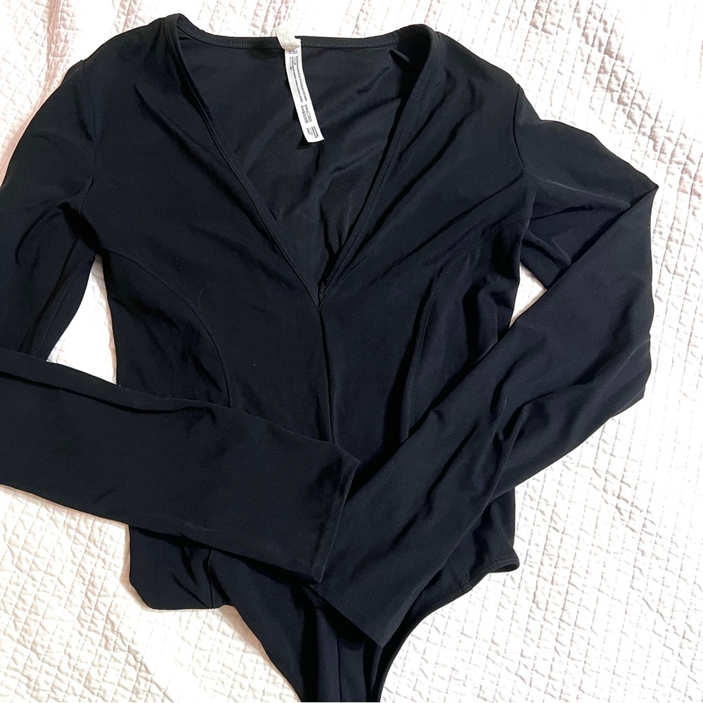 FREE PEOPLE Black deep-V  thong bodysuit. Long sleeve Size Small